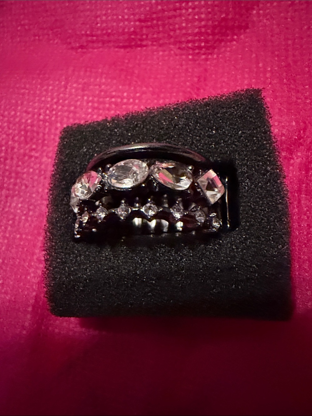 Ring, Stretch, Clear Sparkling Stones set in a Gunmetal finish (J296)